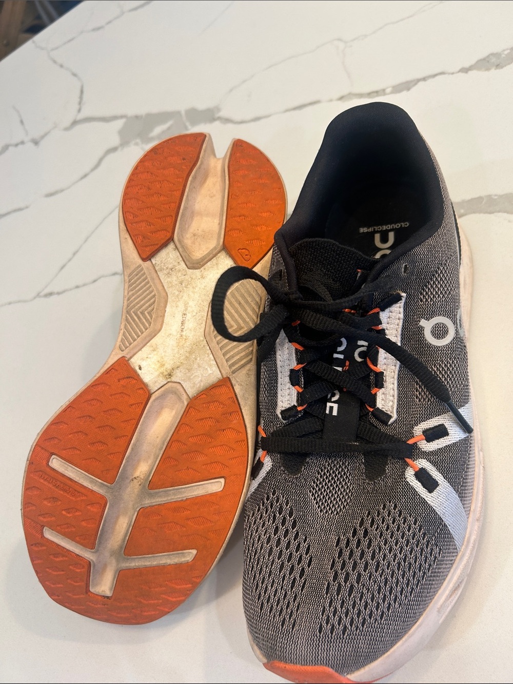 On Running Gray and Black Women's Running Sneakers with Orange Accents - Picture 4 of 6
